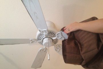 Dust your ceiling fan with an old pillowcase